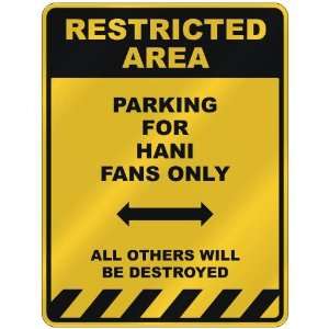  RESTRICTED AREA  PARKING FOR HANI FANS ONLY  PARKING 