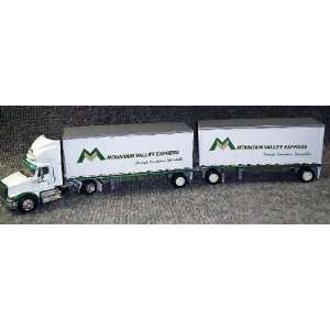   Brand New two axle frame with Pup Trailers.   1/64 Scale Toys & Games