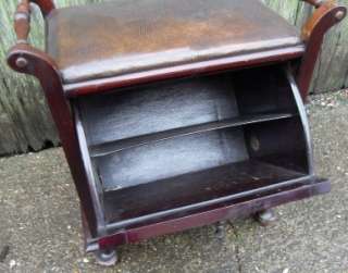 HERE IS A PIANO STOOL FROM THE 20s 30s IN GOOD SOLID CONDITION BUT 