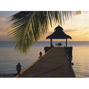  Couple Looking at Sunset on a Jetty, Maldives, Indian 