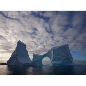  Arch, under a Cloud Filled Sky, Antarctic Peninsula, Antarctica 