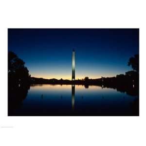 Reflection of an obelisk on water, Washington Monument, Washington DC 