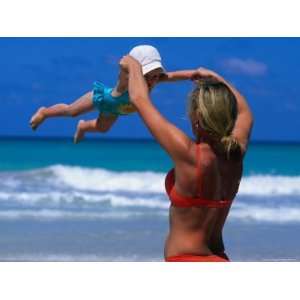 Mother Swinging Baby on Varadero Beach, Varadero, Cuba Photographic 