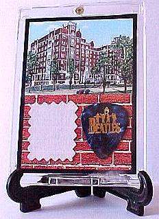 beatles vernon manor hotel bed sheet swatch and guitar pick display a 