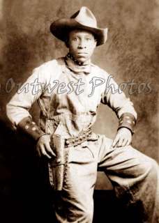 PHOTO OF A BLACK BUFFALO OLD WILD WEST COWBOY WITH LEATHER HOLSTER 