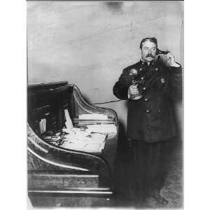   Department,Inspector McCafferty on telephone,c1908,NY