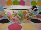 Assorted Mugs, Cups Saucers, Other Souvenir China items in mug store 