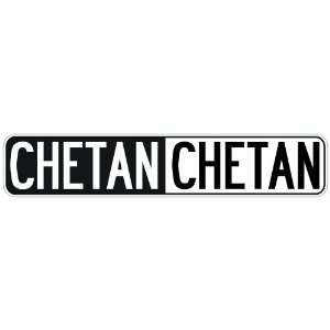   NEGATIVE CHETAN  STREET SIGN