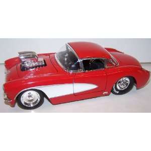   Big Time Muscle with Blown Engine 1957 Chevy Corvette in Color Red
