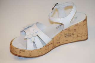 She will love these cute Wedge Sandal. Patent style strap with a 