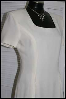   style sheath dress, fully lined, short sleeve, back zip & hook closure