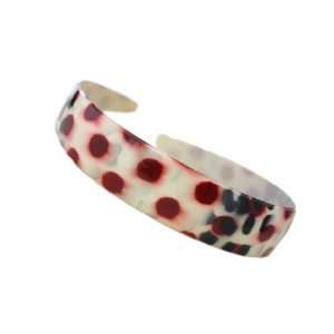   And White Splatter And Spotted By Hand Decorates This Headband Beauty