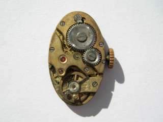 ETA oval 20s watch movement sold for parts or repair  