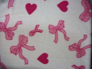 Fleece fabric BTY pink breast cancer ribbon/bow/heart  