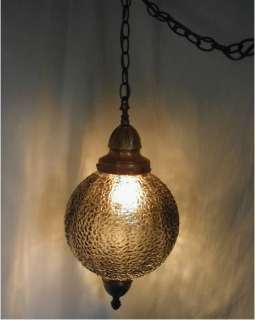   smoke glass ball shade with crackle texture glass is colored and not