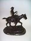 important bronze charles marion russell statue of will rogers for