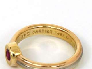 this is a designer cartier tri color 18k gold and ruby