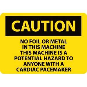  C562PB   Caution, No Foil or Metal In This Machine Is A 