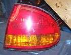 99 00 01 02 03 04 OLDSMOBILE ALERO TAIL LIGHT WITH WIRES PASSENGER 