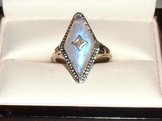   WHITE GOLD RING WITH  RAIN B OW  CABOCHON MOONSTONE AND SMALL