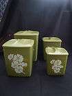 vintage avocado green plastic canister set with flowers returns 