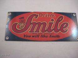 SMALL METAL SMILE SODA POP DRINK ADVERTISING SIGN  