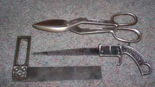 nice lot of three vintage toolsa pair of tin siccors, square and a 