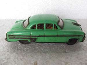 Vintage Friction Green Color Sedan Car Tin Toy  