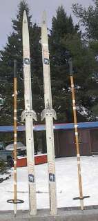 The skis measures 57 (150 cm) long. Have 3 pin 75 mm bindings. The 