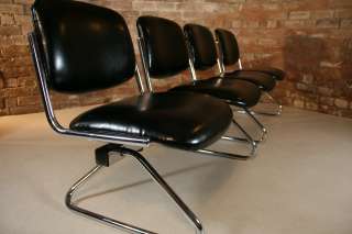   70s airport lounge bench seat, re upholstered in black Eco leather