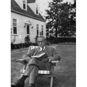  At His Home, James M. Curley, Reads Poetry So That He Can 
