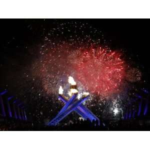  Fireworks Explode Behind the Olympic Flame at Opening Ceremony 