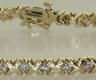 10k yellow gold .90ct 11.2g diamond tennis bracelet hugs kisses 