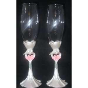   Groom with Pink Calla Lily Bouquet Toasting Glasses