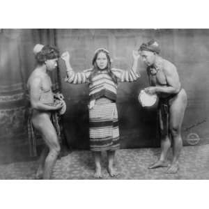   men with tambourines. Iggerote i.e. Igorot dance